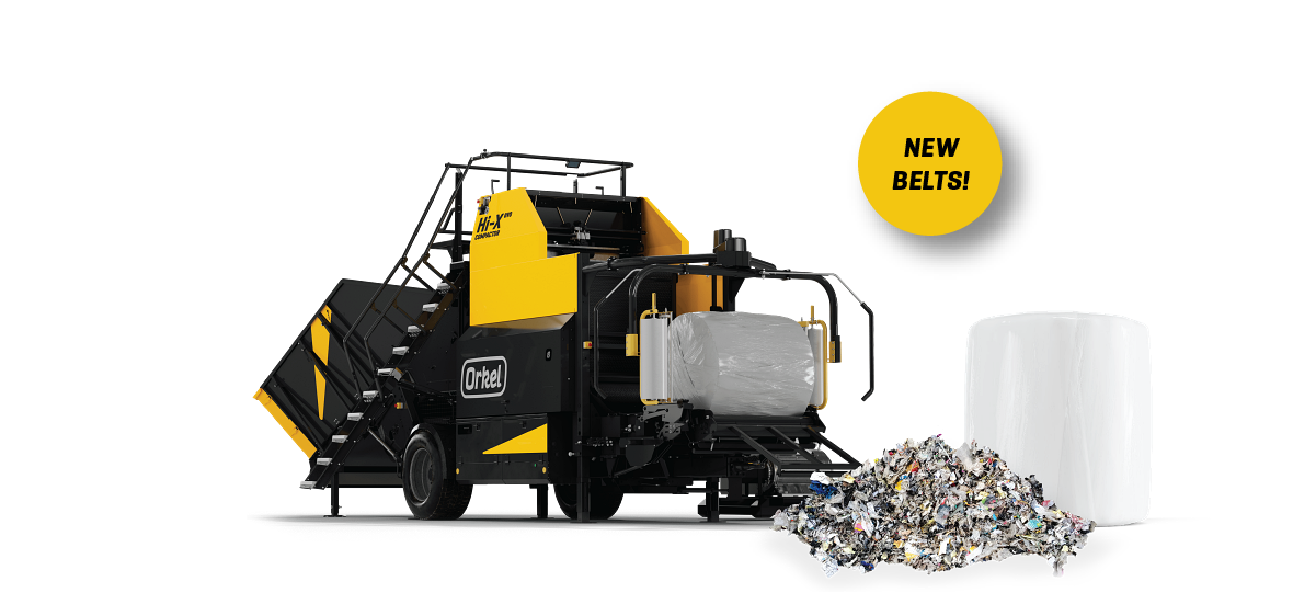 A 3d model of an Orkel industrial compactor with a small pile of waste in front of it and a note saying "new belts"