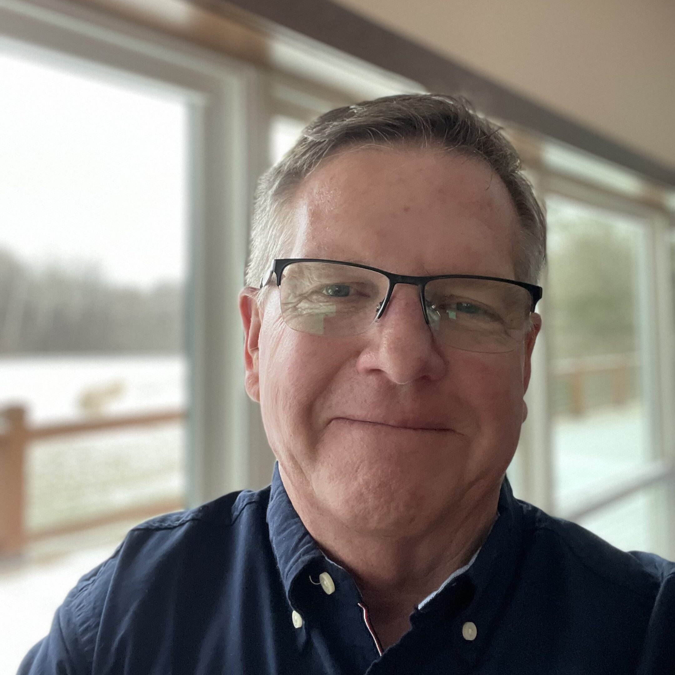 Ein Porträtfoto von Herrn Fred Circle, CEO von FDC Enterprises, der sich über die Reduzierung der Ernteverluste freut